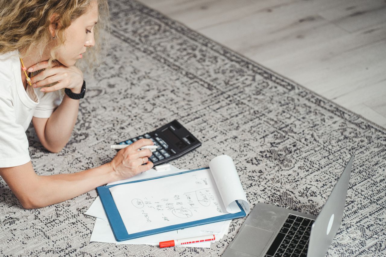 Consumer reviewing vehicle repayments while seeking a debt counsellor near me for financial assistance